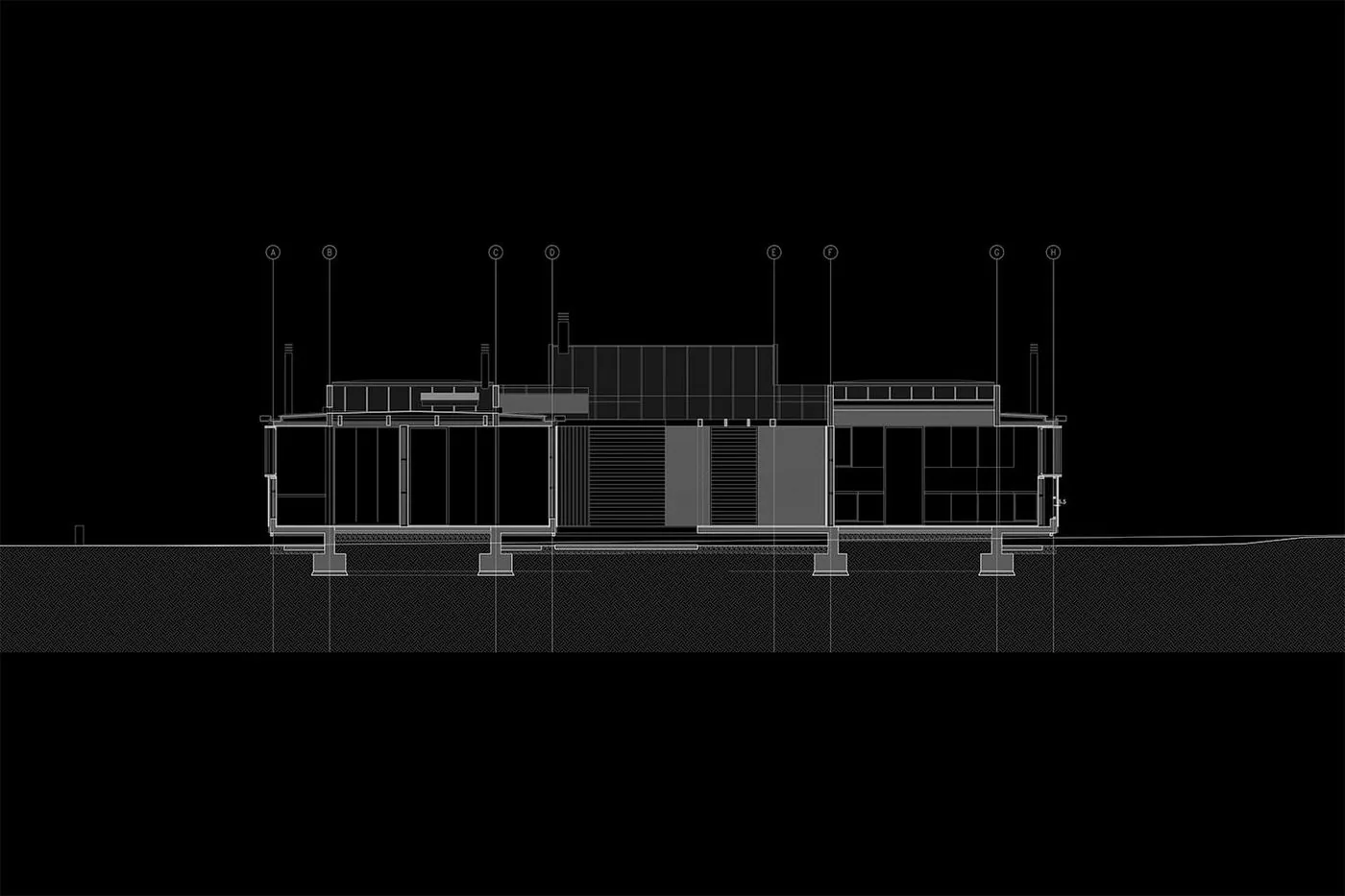 Casa TH — corte transversal por el espacio central de mayor altura
